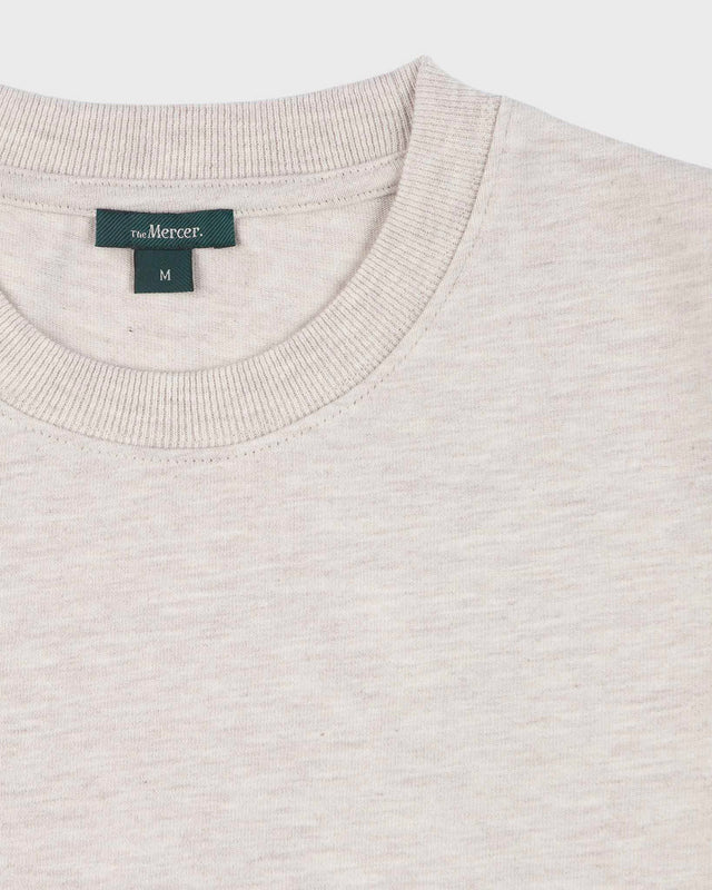 The mercer logo tee off white